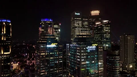 Night aerial drone view Menara Mandiri at Sudirman Street Stock Footage 320045185