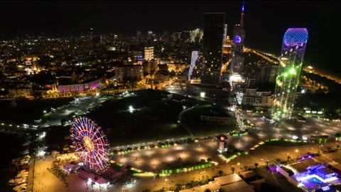 Night aerial hyperlapse, Batumi with Ferris wheel Stock Footage 213946105