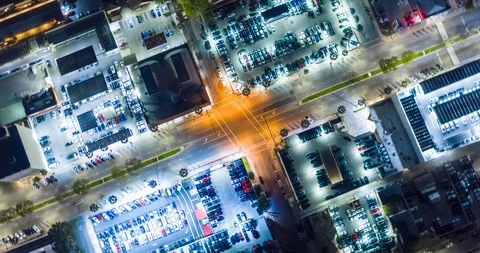 NIGHT Aerial Motion Timelapse (Hyperlapse) High Wide Intersection Circle Around Stock Footage 128617994