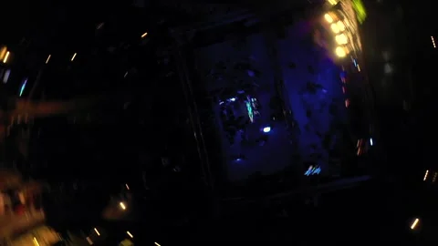 Night aerial rotating drone shot of people dancing at a Big Fat Indian Wedding Video stock 328815997