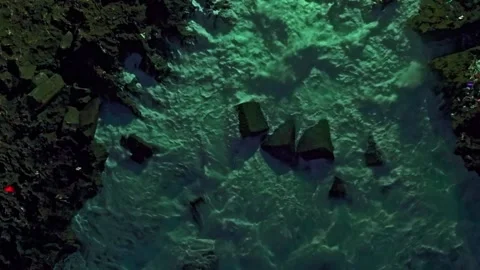 Night Aerial Top-Down View of Ocean Waves Crashing Against Rocks at Santo 스톡 동영상 345040285