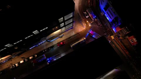 Night aerial view of an emergency with multiple fire engines 動画素材 236372863