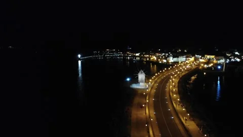 Night aerial view of old mill, road and the center of old Nessebar, houses, Video stock 266517342