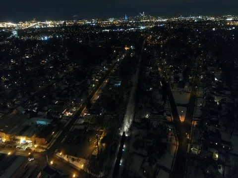 Night Aerial View of Westbound Train through Audubon and Oaklyn New Jersey Stock Footage 71409332