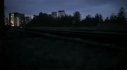 Night approaching with train passing-Time Lapse Stock Footage 10700739
