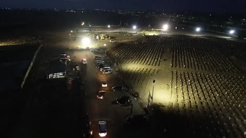 NIGHT ARIAL VIEW OF COVID 19 CEMENTERY AT ROROTAN JAKARTA, INDONESIA. Stock Footage 157541177