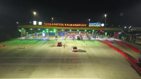 NIGHT ARIAL VIEW TRAFFIC JAM IN KALIKANGKUNG TOL CENTRAL JAVA, INDONESIA Video stock 138214148