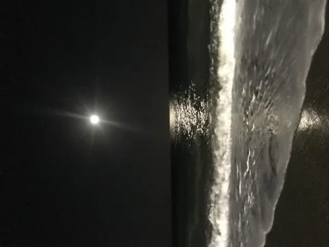 Night at the beach in moonlight Stock Photos