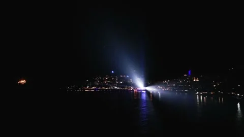 Night beach party skyline lights Stock Footage 228641335