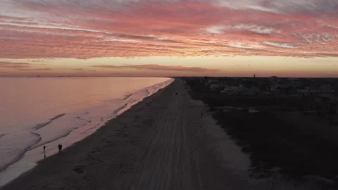 Night on the beach with a pink sky Stock Footage 202176537