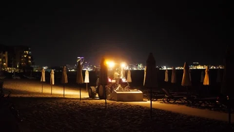Night beach tractor by lantern light Stock Footage 336009106