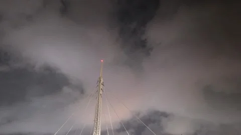 At night, billowing clouds fly over the lightning rod. Stock Footage 278178706