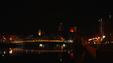 Night bridge reflection with churches, Gdansk Video stock 338324786