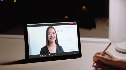 Night business study late video call coach tablet Stock Footage 232566517