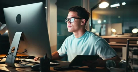 Night, businessman and reading on computer for programming, web development or Stock Footage 301631585