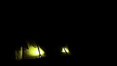 Night Camping Tent Illuminated from Inside in a Dark Outdoor Landscape at Cozy 库存影片 345252493