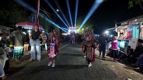 Night Carnival Parade Featuring Ornate Traditional Dancers And Spotlights Stock Footage 345159120