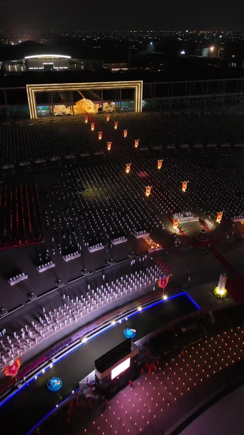 Night Ceremony with Thousands of Lights Illuminating an Arena in Bangkok, Stock Footage 335940623