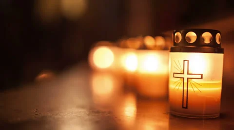 Night of Churches, close-up shot of burning candle with cross symbol Stock Footage 38670267