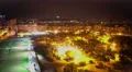 Night city aerial pan, lights sparkling in darkness, electricity consumption 4k or 4k+ Resolution