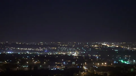 The night city on the the background of cloud. Real time capture Stock Footage 62872995