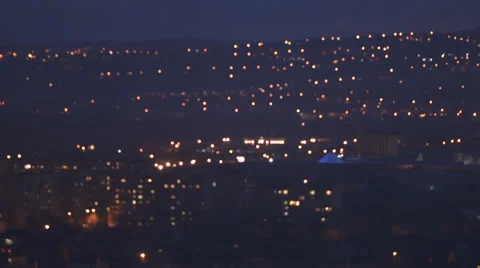 The night city on the the background of cloud. Real time capture Stock Footage 62873174
