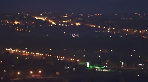 The night city on the the background of cloud. Real time capture Stock Footage 62873191