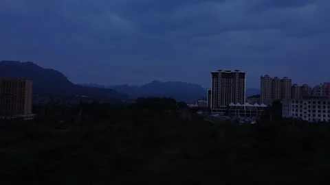 Night city blue clouds Stock Footage 247363603