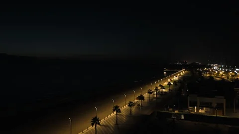 Night city on the coastline Stock Footage 274983517