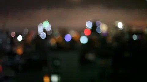 Night city is defocused with nice bokeh and typical city noise Stock Footage 74747123