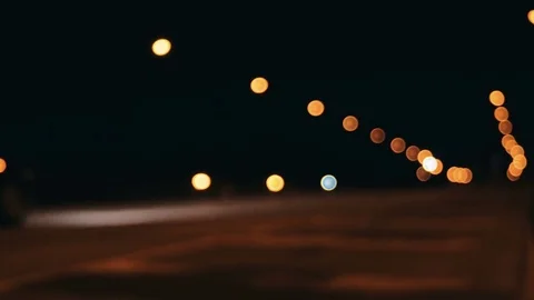 Night city lights defocused with nice bokeh. 4k shot Video stock 83761606