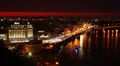 Night city quay, ferry boat docking, city lights, cars HD Footage