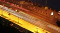 Night city road time lapse cars move leaving long traces HD Footage