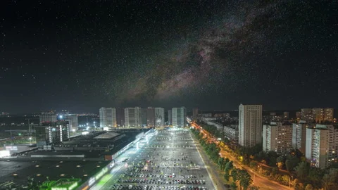The night city on a starry sky background. time lapse Stock Footage 160200720