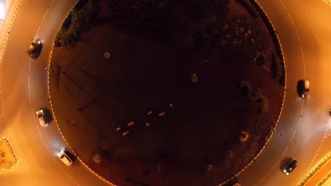 Night city traffic on circle intersection in Paphos, Cyprus. Aerial top down Stock Footage 120685733