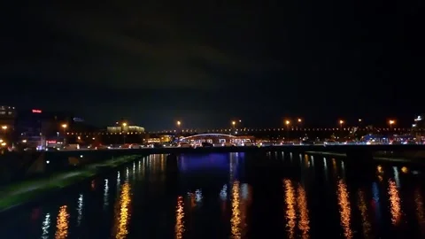 Night city. View of bridge over Vistula River in Krakow, Poland Stock Footage 291334787