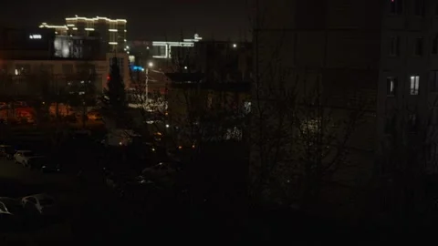 Night city view with glowing windows and distant building lights Stock Footage 333525382
