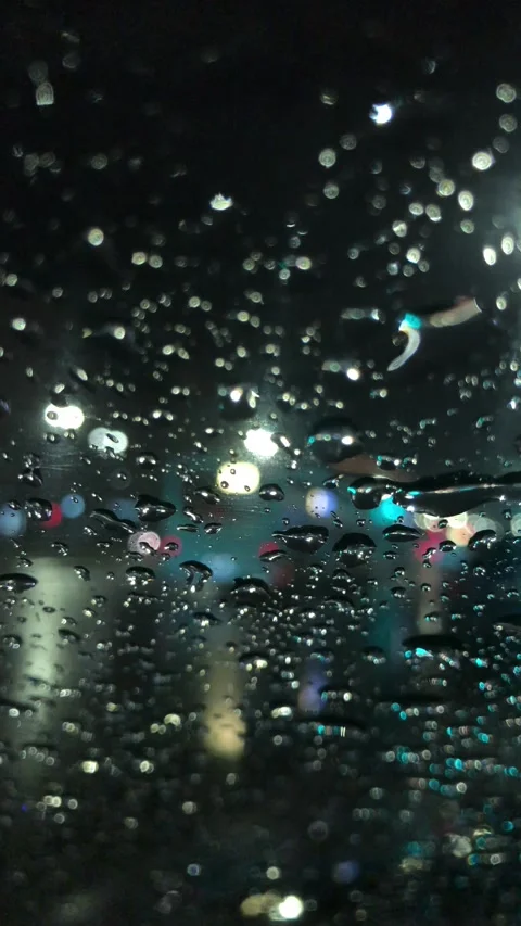 Night City View Through Rainy Car Window With Passing Traffic Stock-Footage 324865484