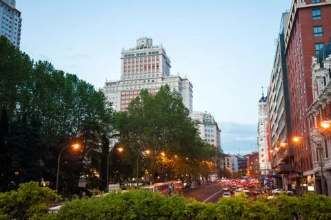 Night city view traffic with Edificio Espana on background in Madrid Stock Photos