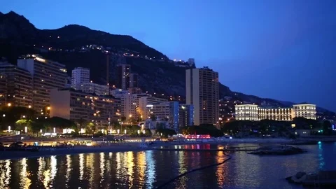 Night cityscape with buildings on the seafront in Monte Carlo, Monaco Stock Footage 71103999