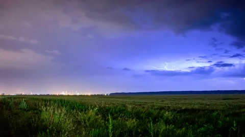 Night cityscape with lightning storm Stock Footage 50716789