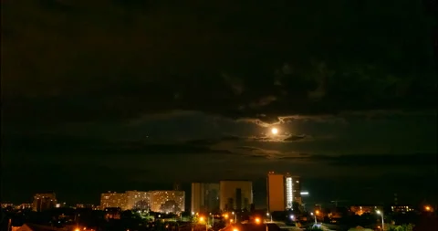 Night cityscape under the moonlight Stock Footage 159063995