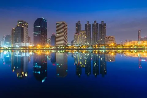 Night cityscape view building reflection on water Stock Photos