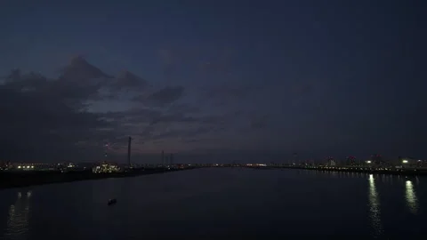 Night cloud timelapse over Tokyo industrial cityscape Stock Footage 260340732