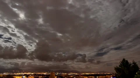 Night Clouds with Moon over city 2 FULLHD - Time-lapse Stock Footage 11882698