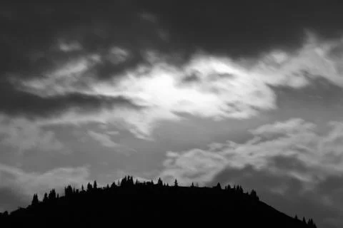 Night clouds in the mountains. Stock Photos