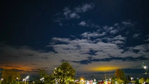 Night clouds over the lights of the night city of Kyiv. Timelapse, 24 fps Stock Footage 254303311