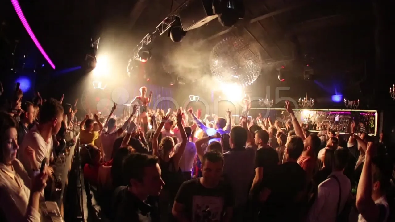 Night club crowd hands up and CO2 jet co... | Stock Video | Pond5