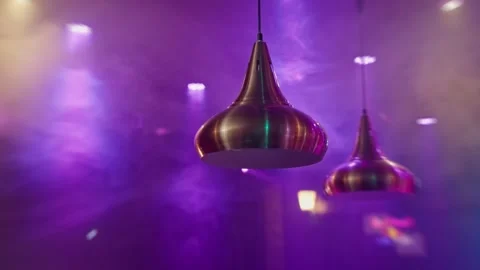 Night club. Explore the elegance of Modern Pendant Lights in a Vibrant and Stock-Footage 310334870