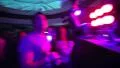 Night club jib shot from light equipment to dancing crowd during party HD Footage